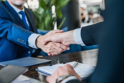 Two people shaking hands
