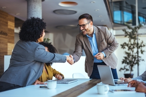 Two people shaking hands